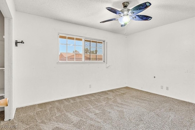 216 Lorenzi St, Las Vegas, NV 89107 - unfurnished room with carpet flooring, ceiling fan, and a textured ceiling