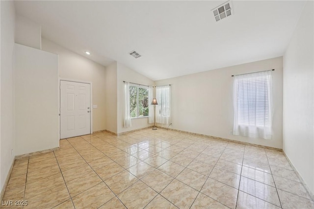 9362 Baltinglass St, Las Vegas, NV 89123 - spare room with lofted ceiling, light tile patterned flooring, and recessed lighting