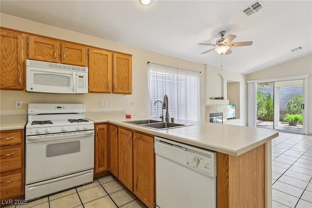 9362 Baltinglass St, Las Vegas, NV 89123 - kitchen with white appliances, a peninsula, light tile patterned floors, a ceiling fan, and lofted ceiling