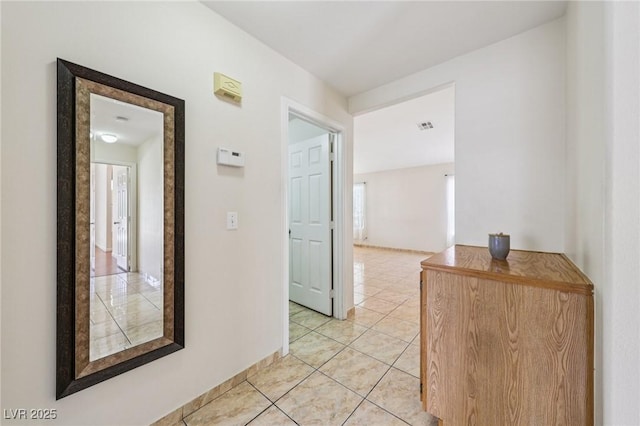 9362 Baltinglass St, Las Vegas, NV 89123 - corridor featuring light tile patterned flooring