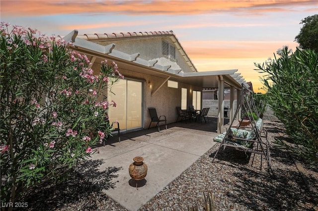 9362 Baltinglass St, Las Vegas, NV 89123 - back of property featuring a patio and stucco siding