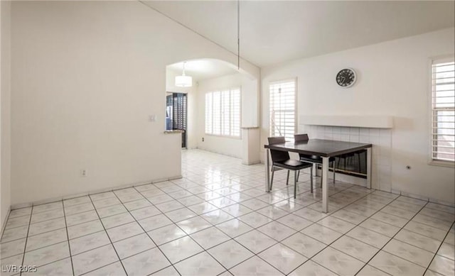 4466 New Dupell Way, Las Vegas, NV 89147 - dining room with arched walkways and light tile patterned floors