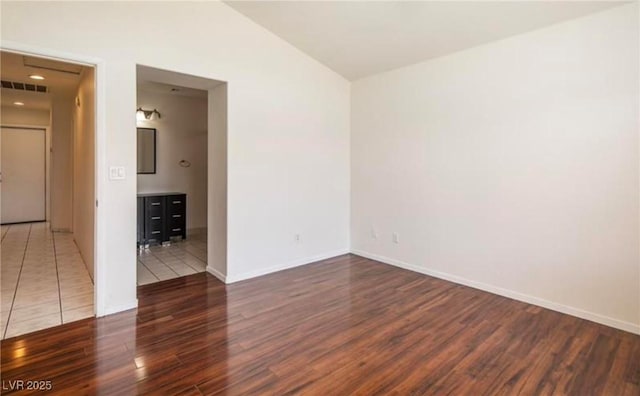 4466 New Dupell Way, Las Vegas, NV 89147 - empty room featuring wood finished floors and lofted ceiling