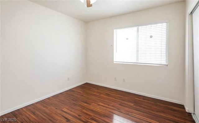 4466 New Dupell Way, Las Vegas, NV 89147 - empty room with dark wood-style flooring, plenty of natural light, and ceiling fan