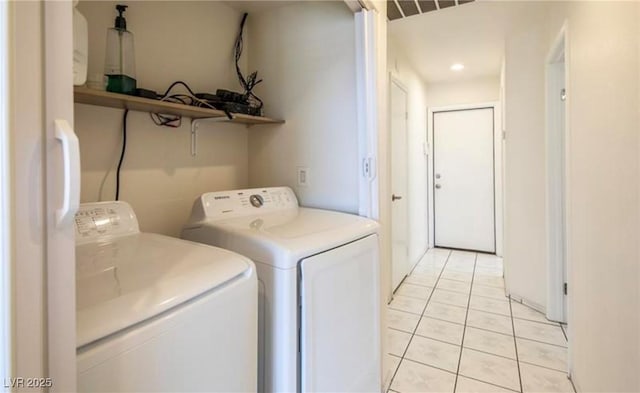 4466 New Dupell Way, Las Vegas, NV 89147 - laundry area featuring separate washer and dryer, light tile patterned floors, and recessed lighting