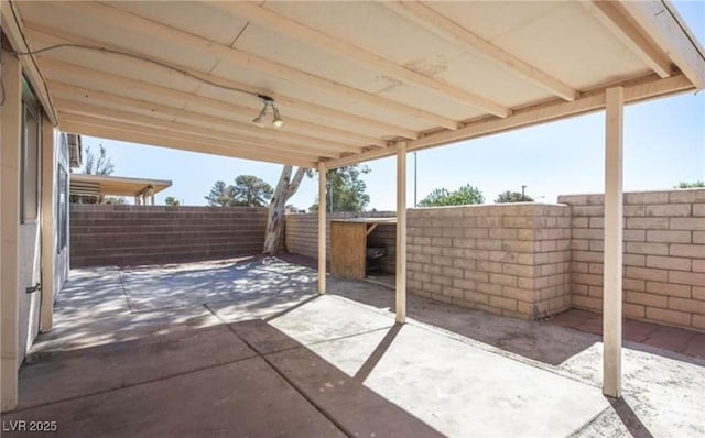 4466 New Dupell Way, Las Vegas, NV 89147 - fenced backyard with a patio