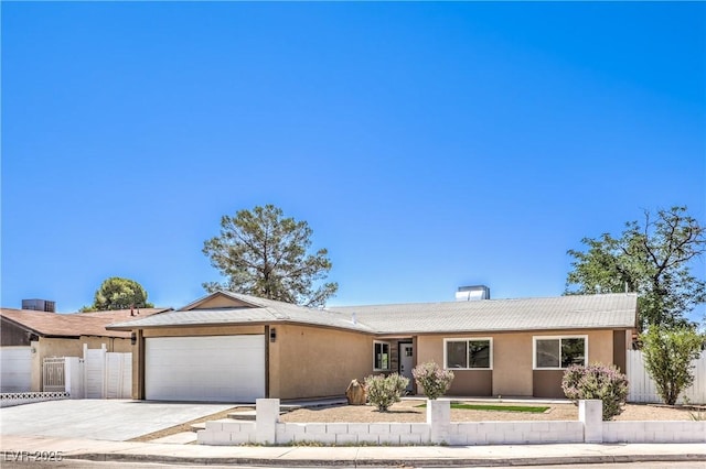 3887 Delling Ct, Las Vegas, NV 89104 - ranch-style home featuring a garage, driveway, and stucco siding