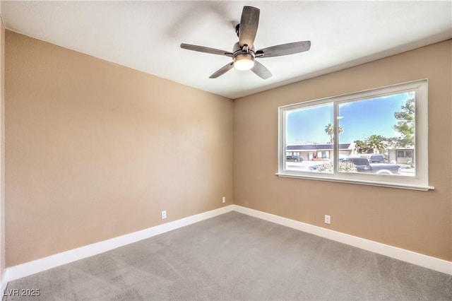 3887 Delling Ct, Las Vegas, NV 89104 - carpeted spare room with baseboards and a ceiling fan