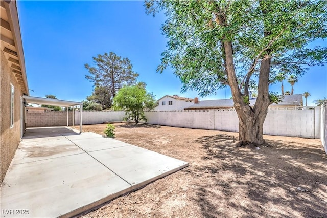 3887 Delling Ct, Las Vegas, NV 89104 - fenced backyard with a patio area