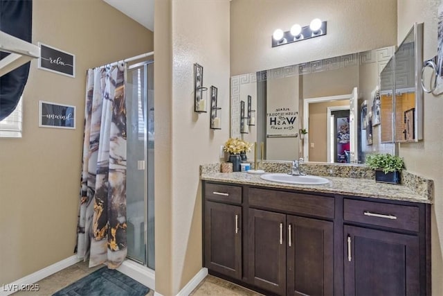 5309 Golden Melody Ln, North Las Vegas, NV 89081 - full bath featuring a shower stall, vanity, and tile patterned flooring