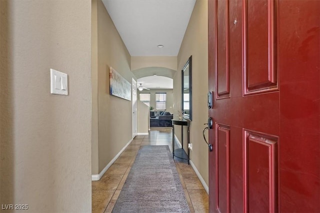 5309 Golden Melody Ln, North Las Vegas, NV 89081 - hall featuring light tile patterned flooring and baseboards