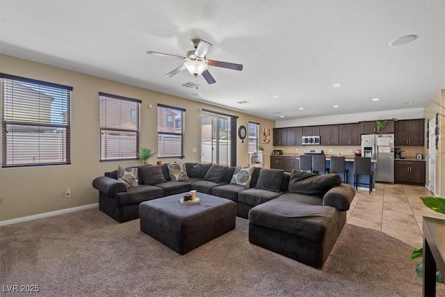 5309 Golden Melody Ln, North Las Vegas, NV 89081 - living area with a ceiling fan, light carpet, and recessed lighting