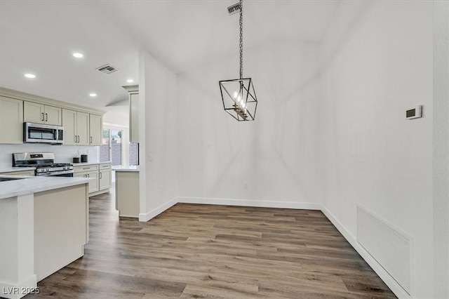 2820 Golf Links Dr, Las Vegas, NV 89134 - unfurnished dining area with recessed lighting, wood finished floors, and a chandelier