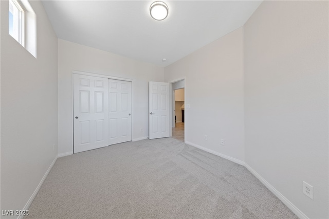 3912 Makushin Bay Ave, North Las Vegas, NV 89081 - unfurnished bedroom featuring carpet floors and a closet