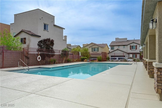 10722 Red Badge Ave, Las Vegas, NV 89166 - community pool featuring a patio area and a residential view