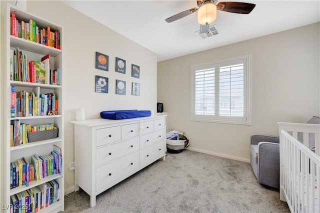 10722 Red Badge Ave, Las Vegas, NV 89166 - bedroom with light colored carpet and a ceiling fan