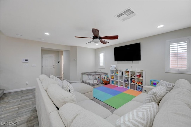 10722 Red Badge Ave, Las Vegas, NV 89166 - living area with recessed lighting, ceiling fan, and wood finished floors