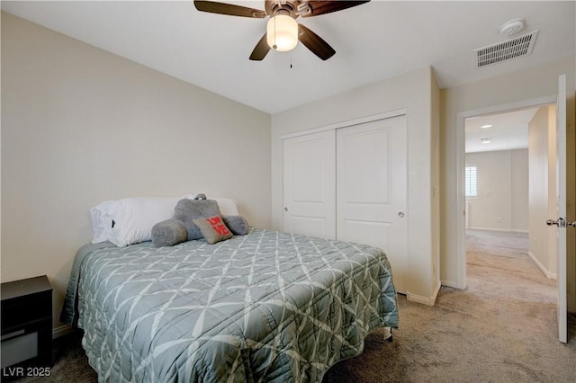 10722 Red Badge Ave, Las Vegas, NV 89166 - bedroom featuring carpet, a closet, and a ceiling fan