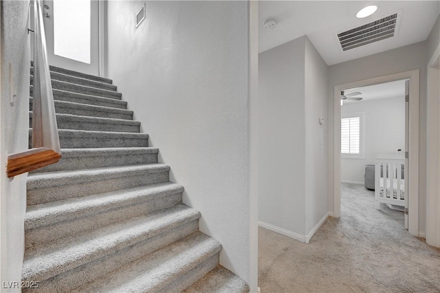 10722 Red Badge Ave, Las Vegas, NV 89166 - stairs featuring carpet flooring and ceiling fan