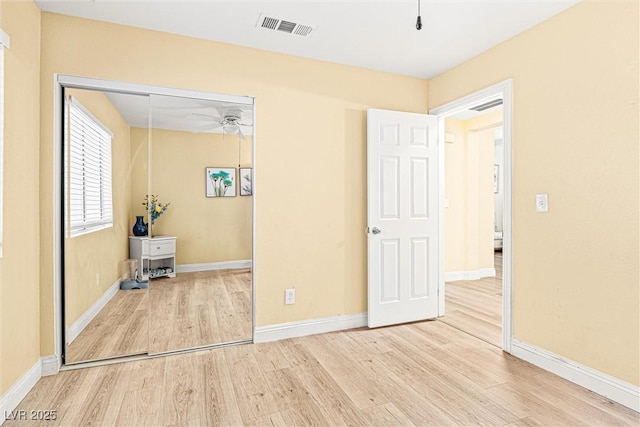 8611 Gabilan Ct, Las Vegas, NV 89123 - unfurnished bedroom featuring wood finished floors and a closet