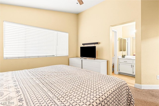 8611 Gabilan Ct, Las Vegas, NV 89123 - bedroom with light colored carpet, ensuite bath, and ceiling fan