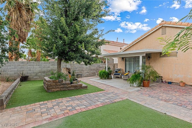 8611 Gabilan Ct, Las Vegas, NV 89123 - fenced yard featuring a patio