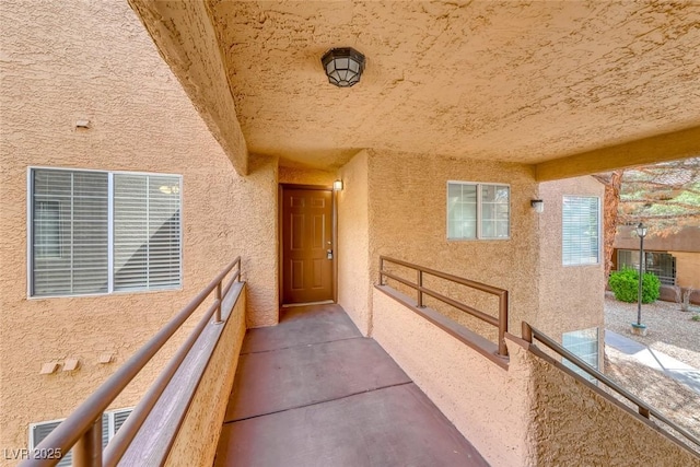 2200 S Fort Apache Rd Unit 2209, Las Vegas, NV 89117 - doorway to property featuring a balcony and stucco siding