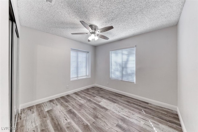2200 S Fort Apache Rd Unit 2209, Las Vegas, NV 89117 - unfurnished room featuring ceiling fan, wood finished floors, and a textured ceiling