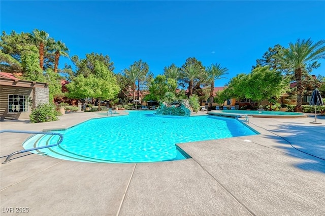 2200 S Fort Apache Rd Unit 2209, Las Vegas, NV 89117 - community pool featuring a patio