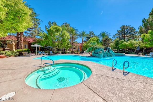 2200 S Fort Apache Rd Unit 2209, Las Vegas, NV 89117 - community pool featuring a patio area and a hot tub