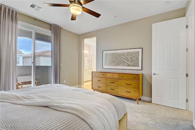 6591 Dove Point Pl, Las Vegas, NV 89130 - bedroom featuring light colored carpet, access to outside, ceiling fan, and ensuite bath