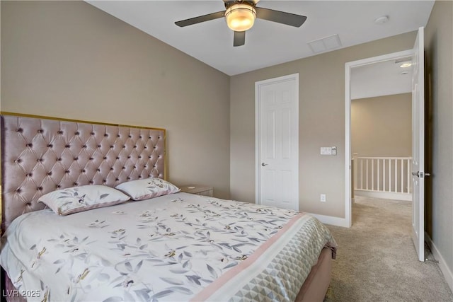6591 Dove Point Pl, Las Vegas, NV 89130 - bedroom featuring light carpet and a ceiling fan