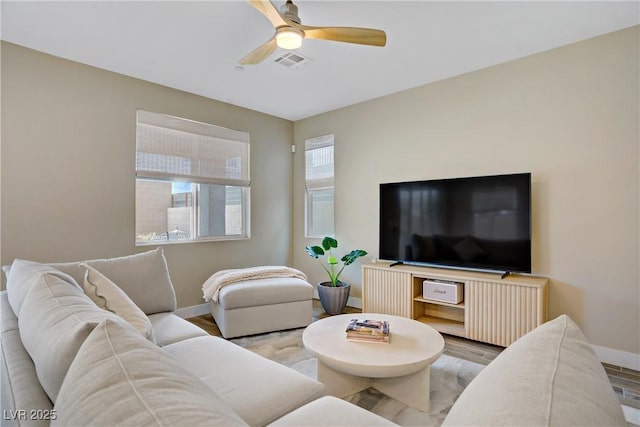6591 Dove Point Pl, Las Vegas, NV 89130 - living area with wood finished floors and a ceiling fan