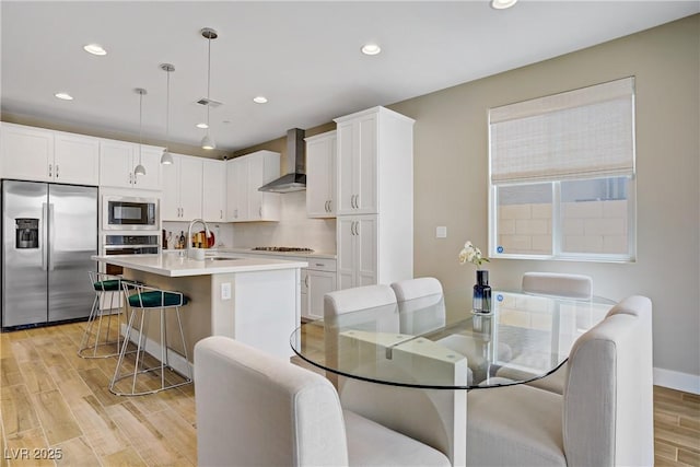 6591 Dove Point Pl, Las Vegas, NV 89130 - dining room featuring light wood finished floors and recessed lighting