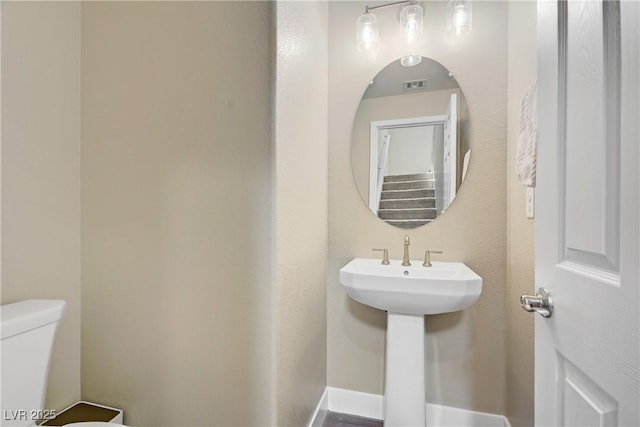 6591 Dove Point Pl, Las Vegas, NV 89130 - half bathroom with toilet and a sink