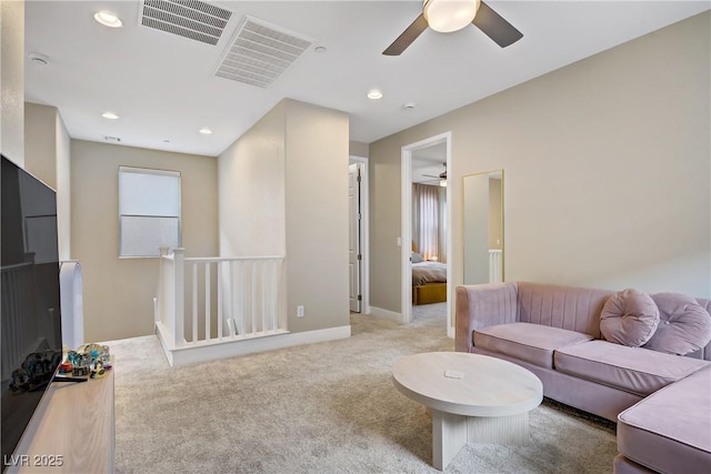 6591 Dove Point Pl, Las Vegas, NV 89130 - carpeted living area featuring ceiling fan and recessed lighting