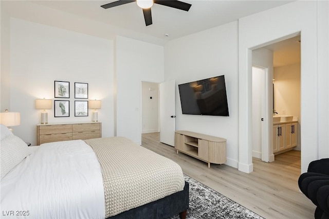 5505 Eagle Cove Ave, Las Vegas, NV 89130 - bedroom featuring light wood finished floors, a ceiling fan, and ensuite bath