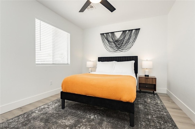 5505 Eagle Cove Ave, Las Vegas, NV 89130 - bedroom with light wood-style flooring and ceiling fan