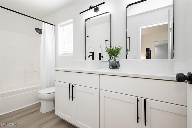 5505 Eagle Cove Ave, Las Vegas, NV 89130 - bathroom featuring vanity, shower / bathtub combination with curtain, and wood finished floors