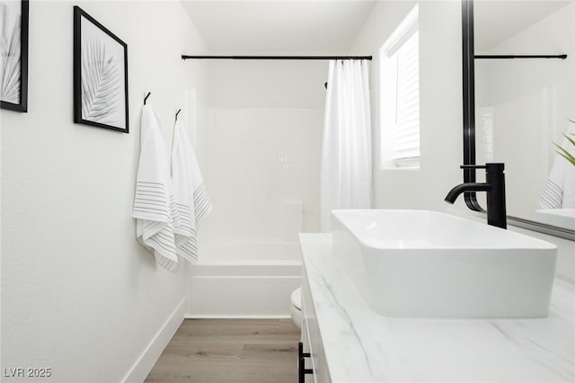 5505 Eagle Cove Ave, Las Vegas, NV 89130 - bathroom featuring shower / tub combo with curtain, vanity, and wood finished floors