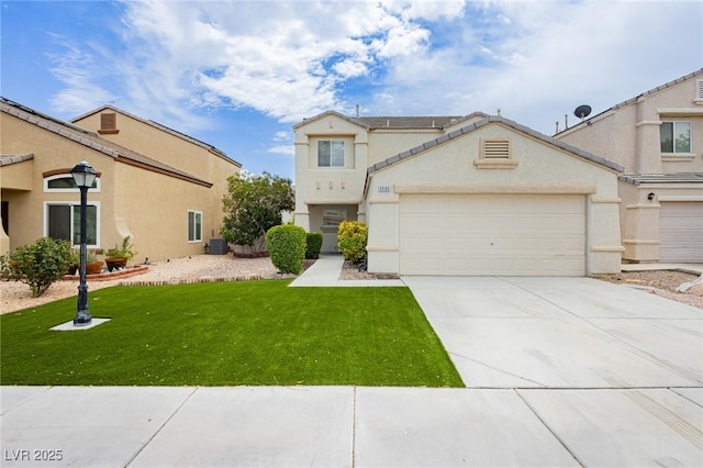 5505 Eagle Cove Ave, Las Vegas, NV 89130 - view of front of house with stucco siding, a front yard, driveway, and an attached garage