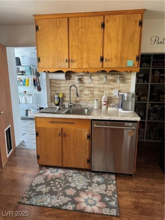 191 S Booker, Tonopah, NV 89049 - kitchen featuring stainless steel dishwasher, dark wood finished floors, and decorative backsplash