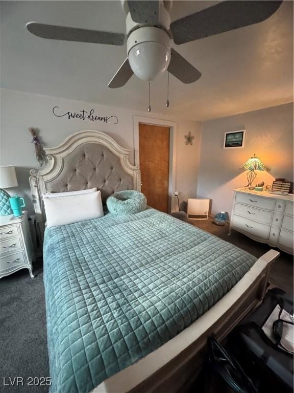 191 S Booker, Tonopah, NV 89049 - bedroom featuring dark carpet and ceiling fan
