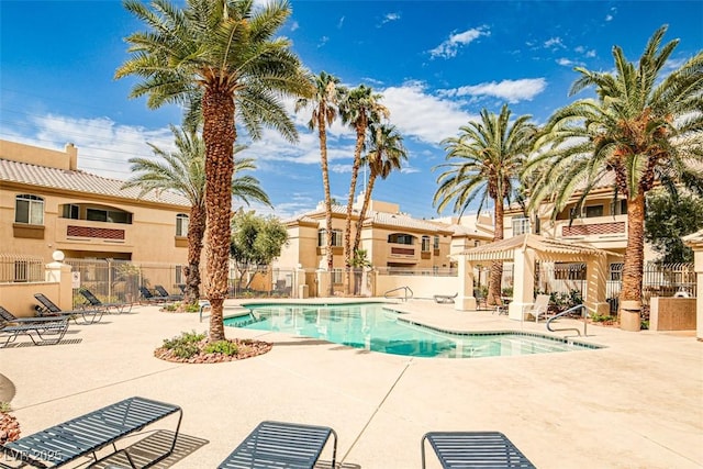 7400 W Flamingo Rd Unit 1051, Las Vegas, NV 89147 - community pool featuring a patio area