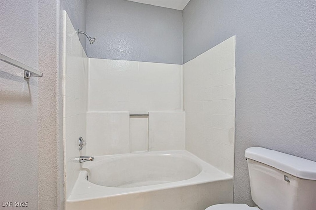 7400 W Flamingo Rd Unit 1051, Las Vegas, NV 89147 - bathroom featuring a textured wall and tub / shower combination