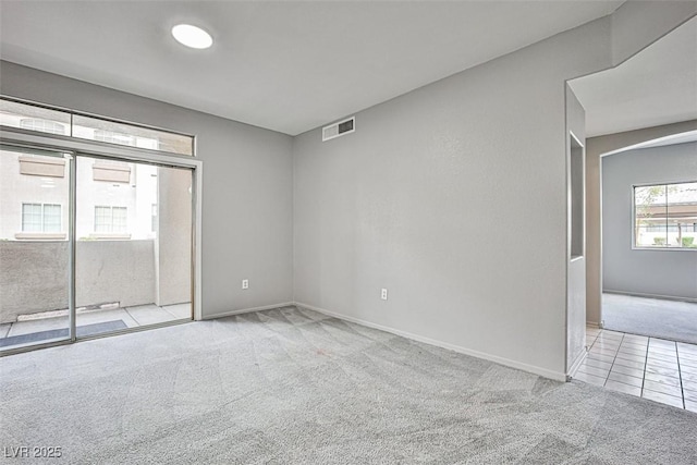 7400 W Flamingo Rd Unit 1051, Las Vegas, NV 89147 - spare room featuring carpet floors and baseboards