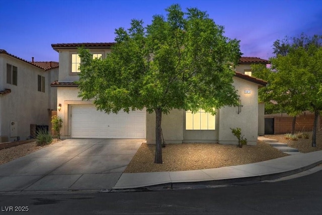 9413 Arcadia Woods Ct, Las Vegas, NV 89149 - mediterranean / spanish-style house with a tile roof, stucco siding, a garage, and driveway