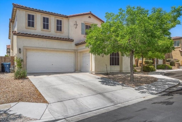 9413 Arcadia Woods Ct, Las Vegas, NV 89149 - mediterranean / spanish-style home featuring an attached garage, a tile roof, stucco siding, and driveway