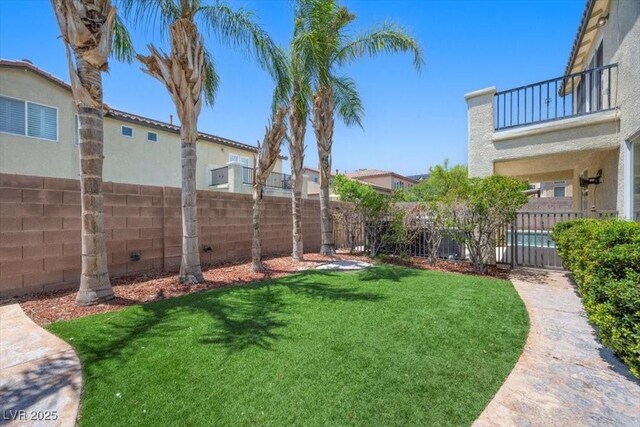 9413 Arcadia Woods Ct, Las Vegas, NV 89149 - fenced backyard with a balcony