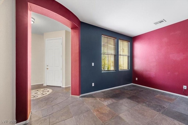 9413 Arcadia Woods Ct, Las Vegas, NV 89149 - unfurnished room with stone tile flooring and baseboards